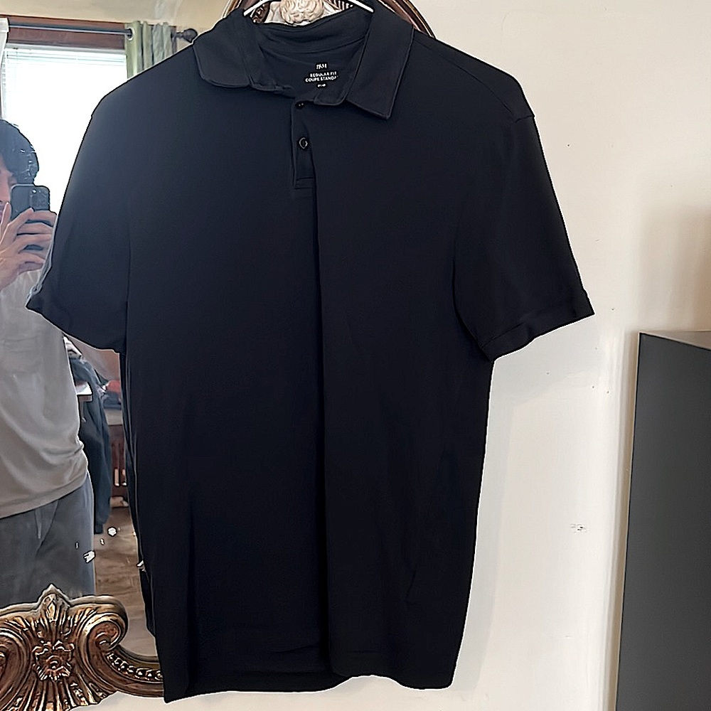 This is an HM Product. A formal event calls for a simple black collared shirt!